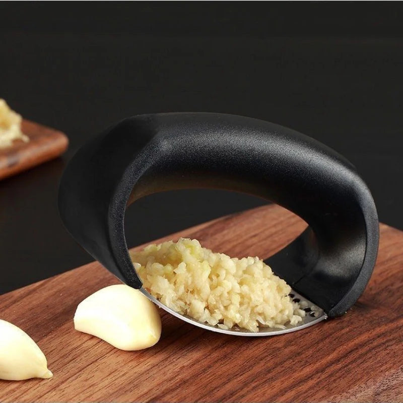 Stainless steel garlic peeler and crusher for home or professional kitchen use