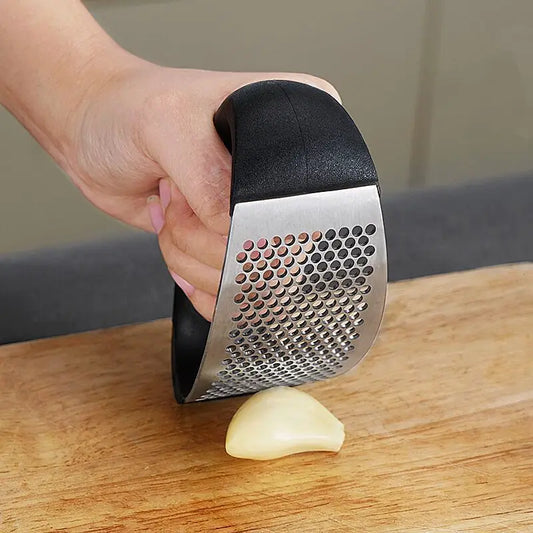 stainless steel garlic press and grinder for peeling, crushing, and grinding garlic